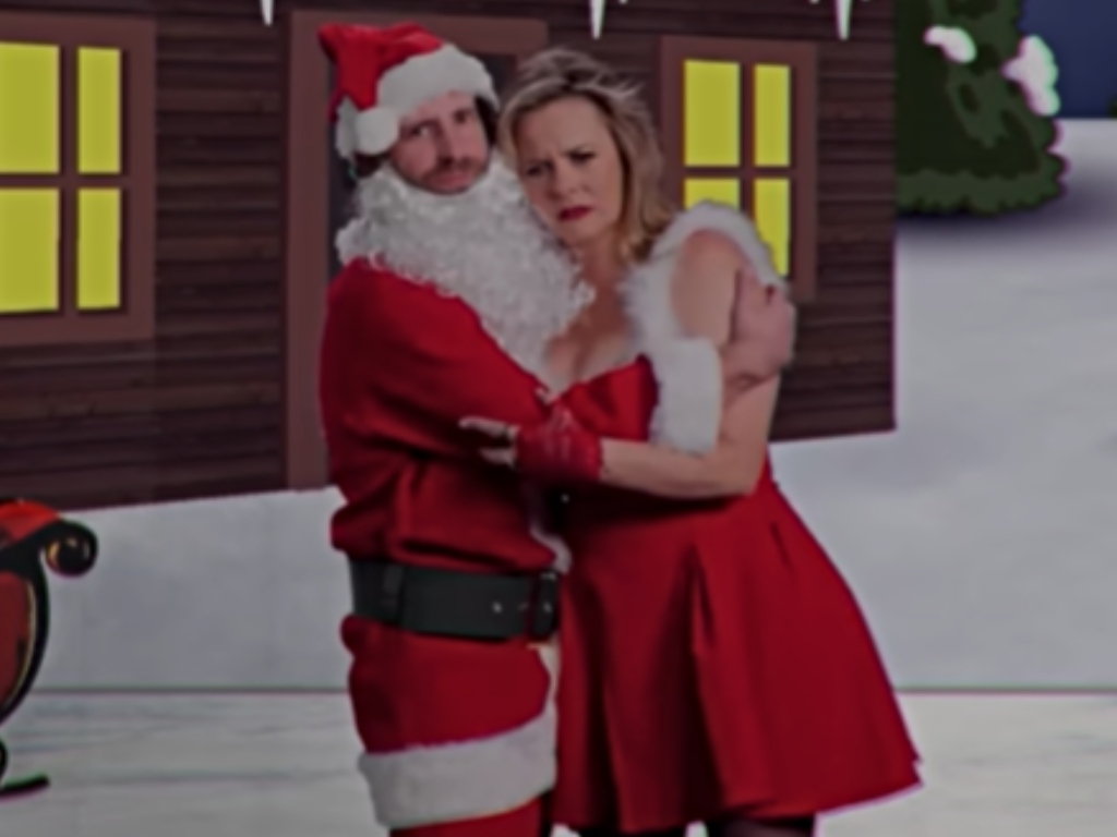 Kyle Mooney and Alicia Silverstone in Christmas music video